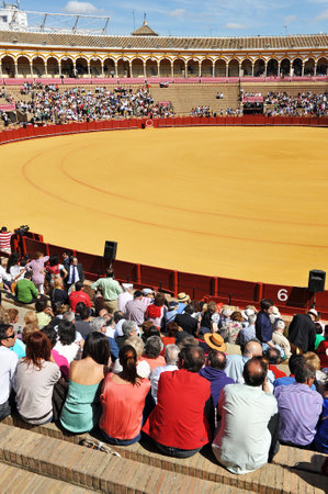 Many people in the Bullring Maestranza, spectacular exhibit, Seville, Andalusia, Spainのeditorial素材