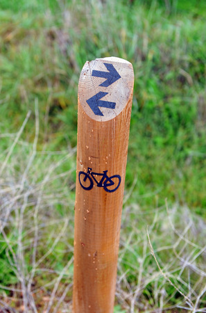 Bicycle tours through the countryside, sign post with icons, mountainbikeの写真素材