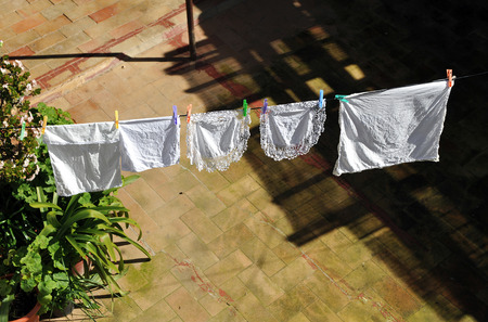 Clothes hanging in the courtyard of the house