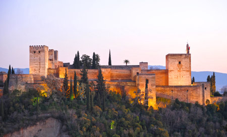 Alhambra Palace of Granada illuminated at night, Alcazaba, Mirador de San Nicolas, Granada, Andalusia, Spainのeditorial素材