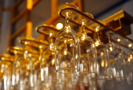 Wine glasses and beer at the barの写真素材