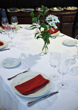 Table set for a banquet in restaurantの写真素材