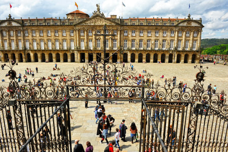 Obradoiro Square in Santiago de Compostela with the city and pilgrims, Way of Santiago, Spainのeditorial素材