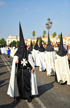 Nazarenes across the bridge of Triana, Holy Week in Seville, Andalusia, Spainのeditorial素材