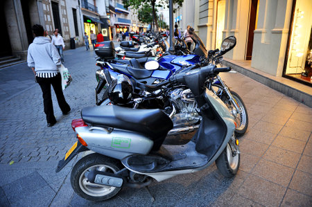 Motorcycle parking on a city streetのeditorial素材