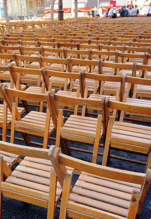 Folding chairs in the street to see the Easter processions in Seville, Spainの写真素材
