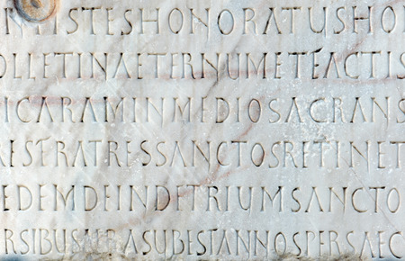 ancient commemorative plaque in marble with a text in Latin
