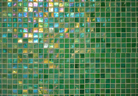 Surface of mosaic tiles, toned gresite in green, decorative backgroundの写真素材