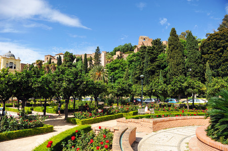 Gardens of Pedro Luis Alonso in Malaga with the Alcazaba in the background, Costa del Sol, Spain.の写真素材