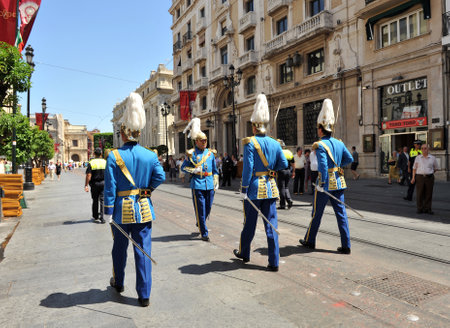 Parade of the municipal police of Seville during the procession of the Corpus Christi, Andalusia, Spainのeditorial素材