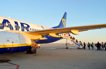 Passengers boarding the jetplane in Faro International Airport, Algarve Region, Portugalのeditorial素材