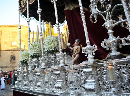 Virgin of Peace of the brotherhood of Holy Supper leaving the cathedral on Palm Sunday. Procession of Holy Week (Semana Santa) in Baeza, province of Jaen, Spain.のeditorial素材