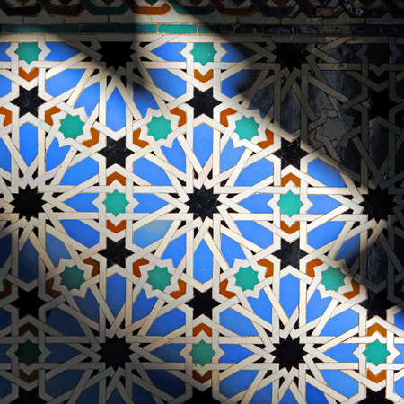 Arabic mosaic tiles of Al Andalus. Seville tiles azulejos. Arab tiles from Spain. Light and shadow...