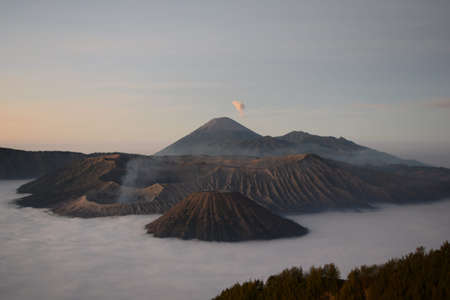 Watching sunrise at Bromo volcano in Java, Indonesiaの写真素材