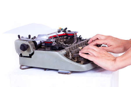 typewriter being used by a person