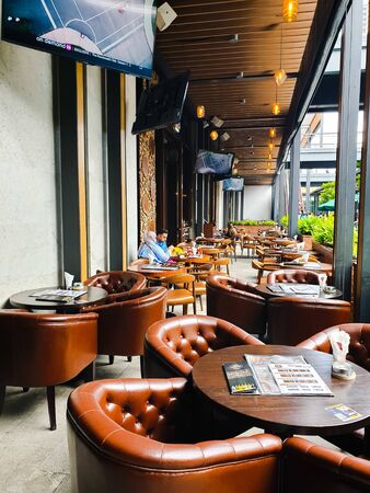 Pahang / Malaysia - July 1, 2019: The scene of a couple enjoying food and drinks at the famous bars and pubs street at Sky Avenue Genting Highlandsのeditorial素材