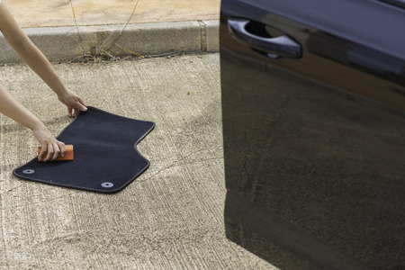 Cleaning car mat.の写真素材