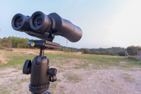 Binoculars on a tripod.の写真素材