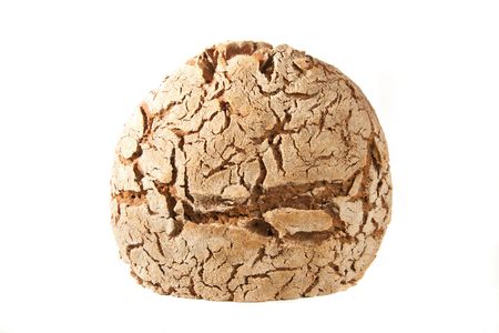 close-up of cutted loaf of hot whole rye homemade bread just out of oven and isolated on white backgroundの写真素材