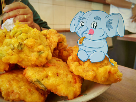 Illustration of a blue elephant eating a corn fritters. Perfect for art, postcards, cards, wall decor, t-shirts, cards, prints, picture books, coloring books, wallpapers, prints, cの写真素材