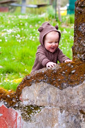 A young boy poses for a portrait with vibrant color and unique personality.の写真素材