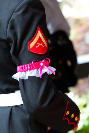 A United States Marine soldier caught the garter at this military wedding for armed forces soldiers and veterans の写真素材