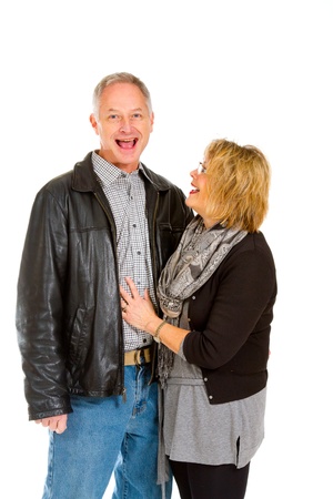 This man and woman look very healthy and in love against an isolated white background in studio.の写真素材