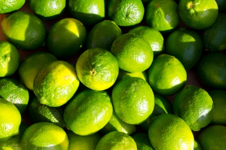 Images from a farmers market in Hawaii showing tropical fruits or vegetables in simple photos with vibrant colors.の写真素材