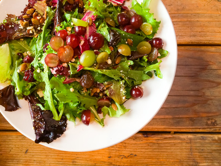 Healthy salad with grapes and nuts at a nice restaurant in Oregon.の写真素材