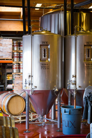 Bend, OR, USA - January 12, 2014: Beer making inside of the Crux Fermentation Project with large fermenters and industrial equipment.のeditorial素材