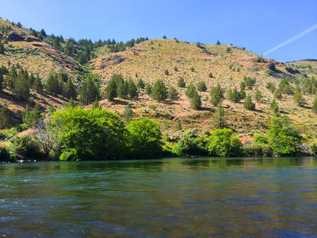 Nature scenic from the Lower Deschutes River wild and scenic canyon section on the water.の写真素材