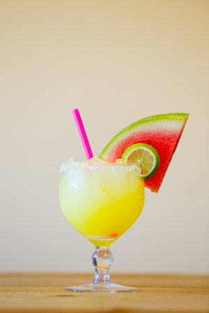 Margarita made with watermelon garnish at a traditional Mexican restaurant bar.の写真素材