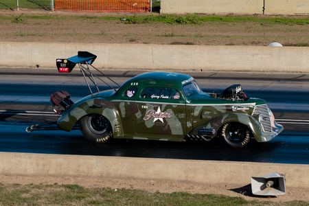 WOODBURN, OR - SEPTEMBER 27, 2015: The Patriot races down the track at over 200mph at the NHRA 30th Annual Fall Classic at the Woodburn Dragstrip.のeditorial素材