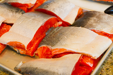 Feshly caught salmon fish filets ready to be cooked.の写真素材