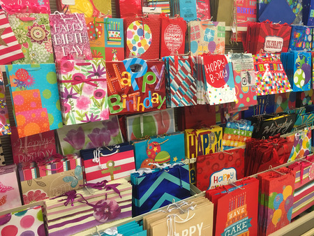 SPRINGFIELD, OR - OCTOBER 28, 2015: Gift bags for birthdays and other events at a grocery store supermarket.のeditorial素材
