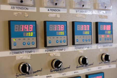 EUGENE, OR - NOVEMBER 4, 2015: Electrical control panel for temperature control of fermenters and...