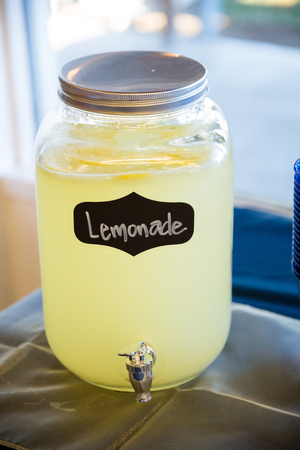 Lemonade in a jar at a wedding reception is the drink of choice for most guests.の写真素材