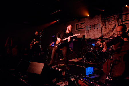 EUGENE, OR - MARCH 26, 2016: Post-rock instrumental band This Patch of Sky performs at the HiFi Music Hall in Eugene, Oregin, USA. The band's talented musicianship and lack of vocals have set them apart, gaining international popularity.のeditorial素材