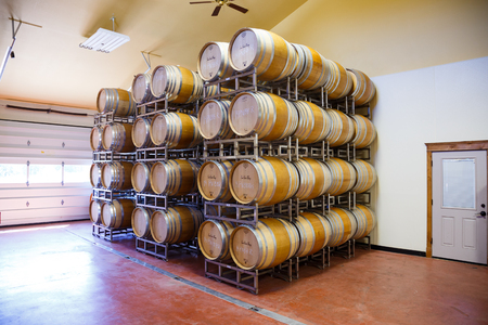 EUGENE, OR - MAY 2, 2015: Barrel room detail of large wine barrels stacked together at Sweet Cheeks...