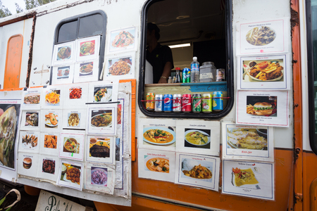 KAHUKU, OAHU, HAWAII - FEBRUARY 27, 2017: Asian fusion cuisine from a food truck at the foodtruck property near the shrimp farms and country town of Kahuku on the North Shore of Oahu Hawaii.のeditorial素材
