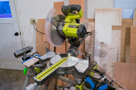 SPRINGFIELD, OR - JANUARY 31, 2017: Ryobi compound miter saw in a cutting shop during a major house renovation construction project.のeditorial素材