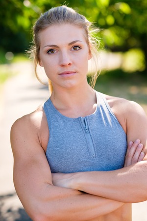 Young Female Athlete Working Out on Trackの写真素材