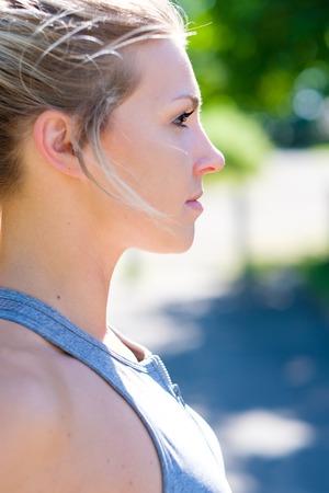 Young Female Athlete Working Out on Trackの写真素材