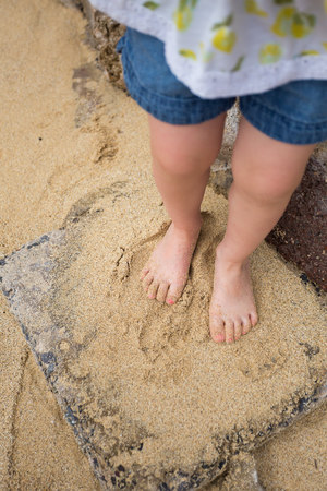 Child Playing on Beach in Oahu Hawaiiの写真素材