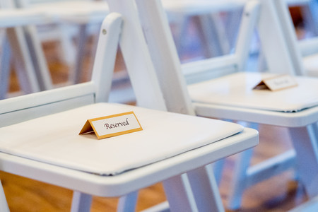 Reserved Sign on Chairs at Weddingの写真素材