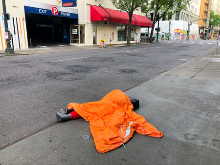 Transient Homeless Person Under Sleeping Bag Editorialのeditorial素材