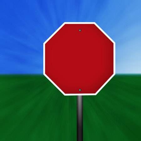 A blank stop sign illustration with a grass and sky background.の写真素材