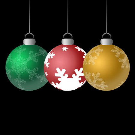 Three shiny Christmas ornaments in red, green, and gold with snowflakes against black background.の写真素材