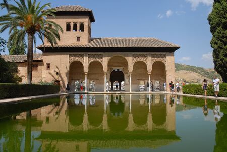 Visitors at the open portico of Torre de las Damas, Tower of The Ladies, Partal, The Alhambra, Granada, Andalusia, Spainのeditorial素材