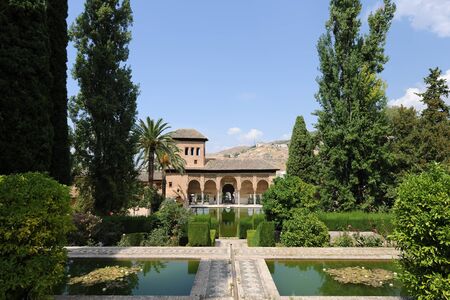 View across the Partal gardens and water features  to  the Torre de las Damas, Tower of The Ladies,...